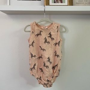 Rylee + Cru peach onesie with circus horses